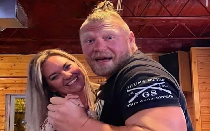 Brock Lesnar in a black t-shirt with his wife.